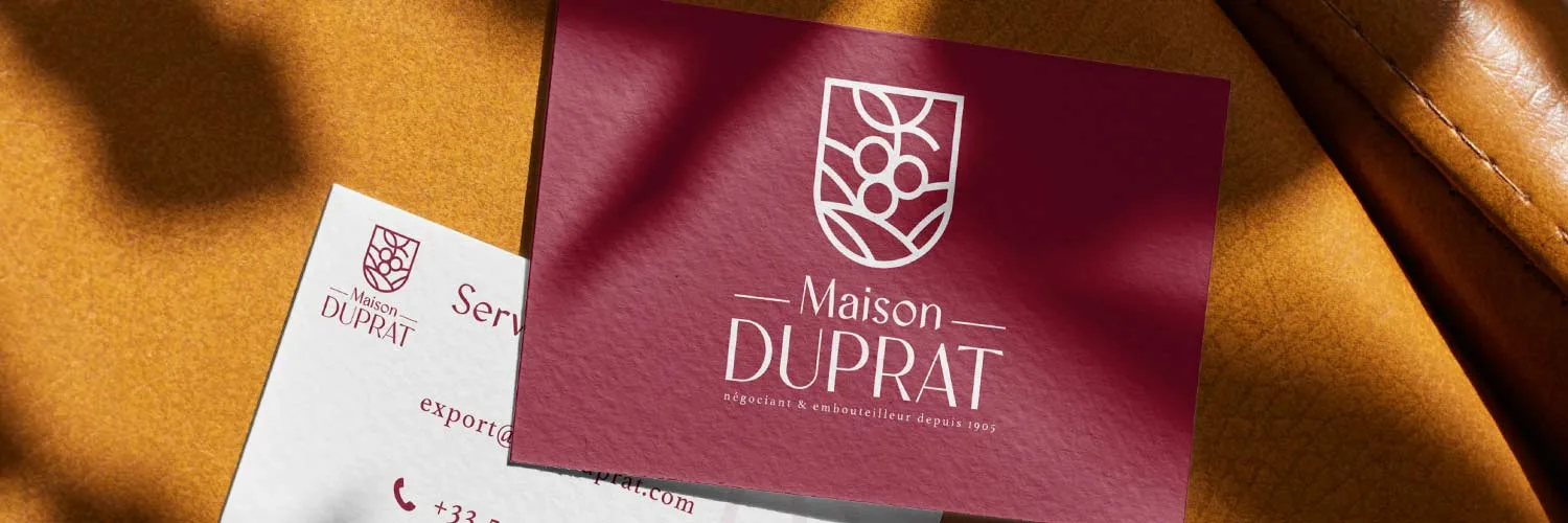 Création et impression de la carte de visite de l'entreprise Maison Duprat situé à Bayonne